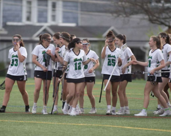 Maya Lalor (12) with the girls varsity lacrosse team.